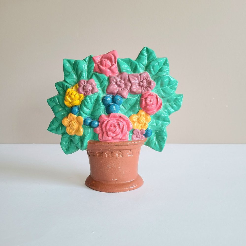 Vintage 1960s cast iron flowers in pot door stop/door stopper/wedge. Bookend.